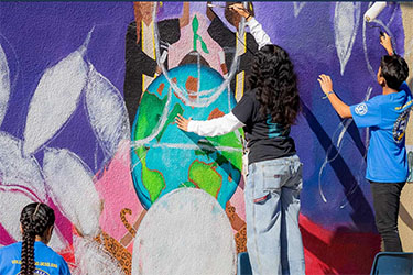 https://www.bridginglivesmag.com/wp-content/uploads/2025/03/mlk-service-painting-2020.jpg