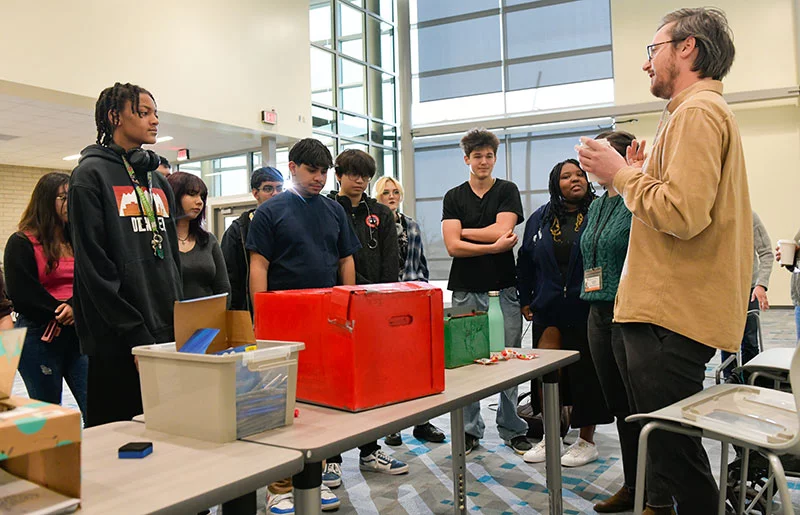 Students at Aurora Science & Technology learn about medical careers and science from Michael Stockton, who is getting a doctorate and does research on the Anschutz Medical Campus where the school is located. Photo by Cyrus McCrimmon, for UCHealth.